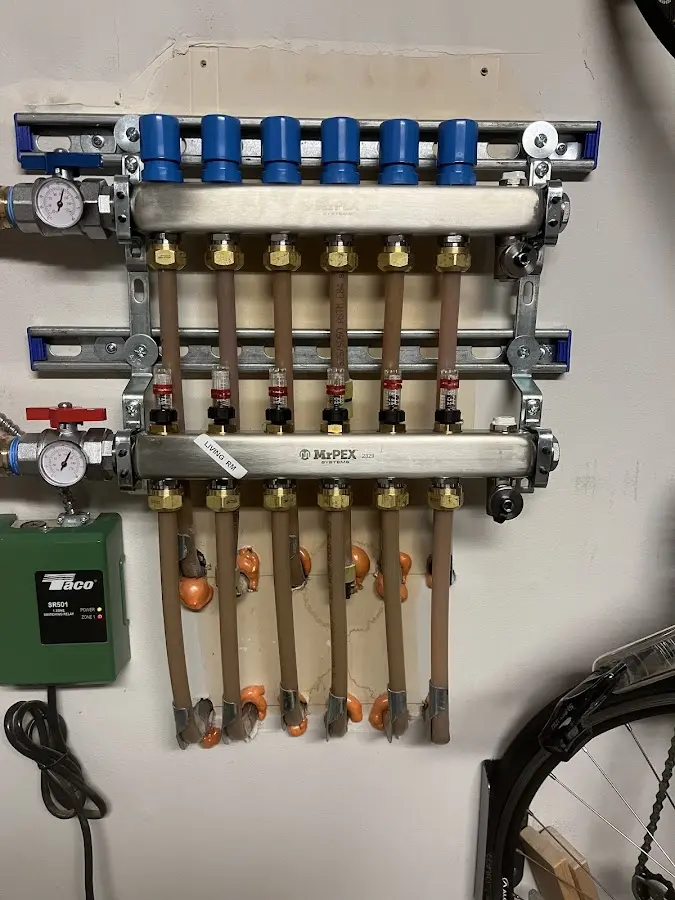 Plumber performing Water Heater Repair at a residential property in Swarthmore